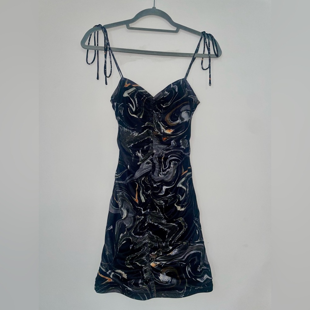 Black mini dress with design size XS